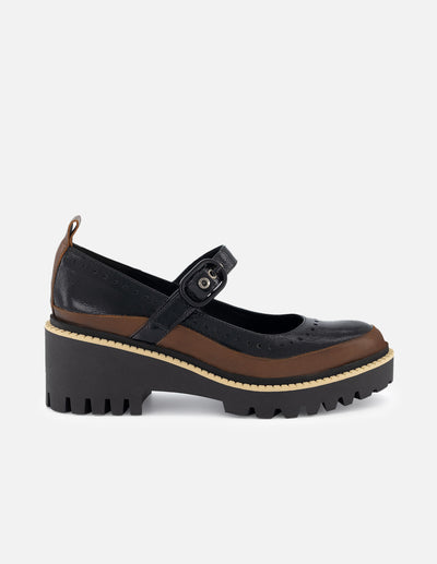 Zapatilla con pulsera tipo mercedes color negro para mujer con detalle bicolor