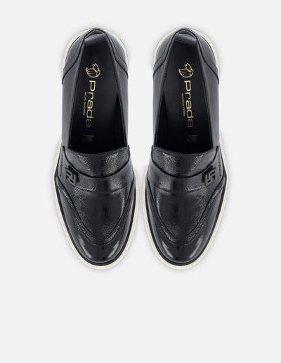 Mocasín de piel color negro para mujer con detalle Pd