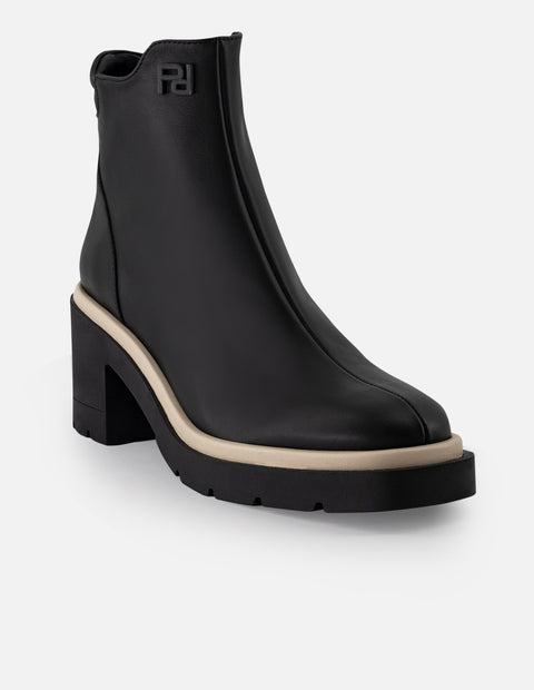 Botín de piel napa color negro para mujer con contraste blanco