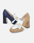 Mocasín en piel cuero contraste de color blanco en los flecos para mujer.