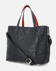 Bolso tipo tote mediano en piel grabada de letras descompuestas Prada en color negra
