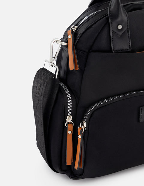 Maleta de nylon color negro para mujer con detalles en piel