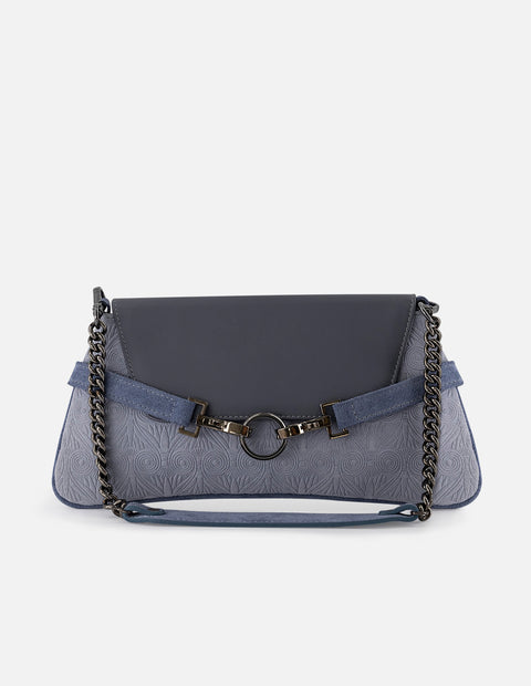 Clutch azul de ante para mujer con adorno color plateado