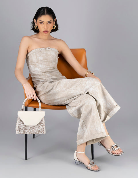 Satchel de piel  para mujer color dorado y acabados metalizados