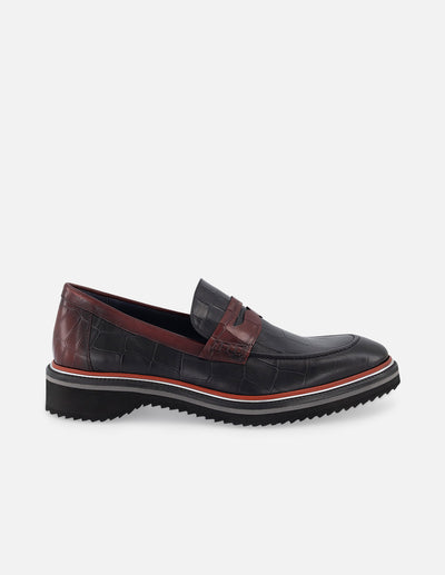 Mocasín en piel con grabado tipo coco en color vino para hombre