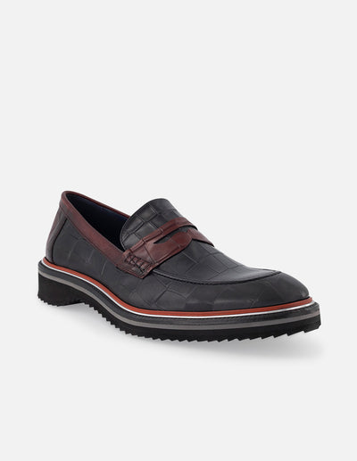 Mocasín en piel con grabado tipo coco en color vino para hombre