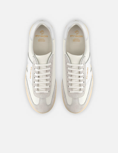 Tenis en piel napa color blanco con detalles en piel ante para hombre