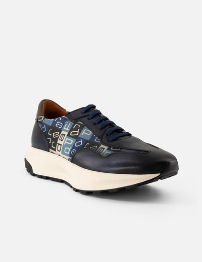 Tenis en piel napa color azul con textil de letras Prada para hombre