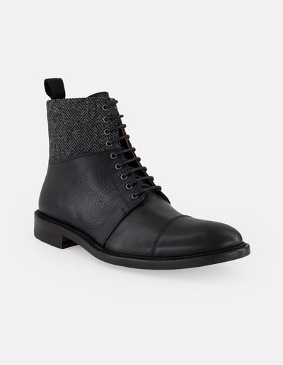 Botines negros piel y textil para hombre con caña tipo espiga