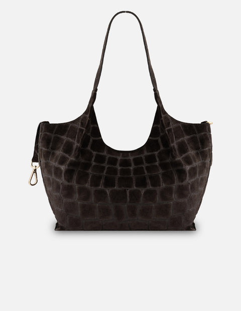 Bolso de hombro café de ante para mujer con accesorio colgante