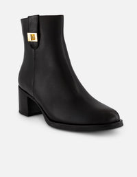 Botines negro piel para mujer con tira lateral