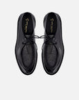 Wallabee en piel florantik y textil color negro con suela de goma para hombre.