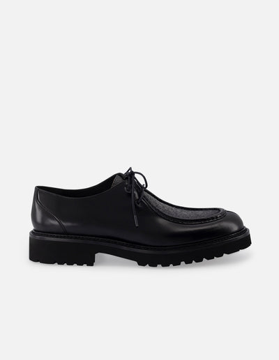 Wallabee en piel florantik y textil color negro con suela de goma para hombre.