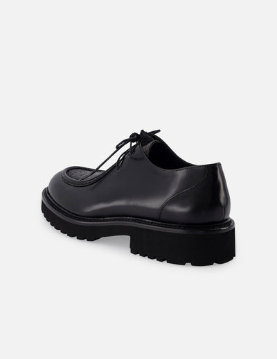 Wallabee en piel florantik y textil color negro con suela de goma para hombre.