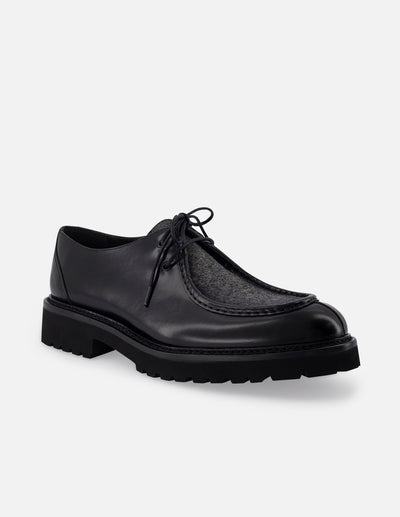 Wallabee en piel florantik y textil color negro con suela de goma para hombre.