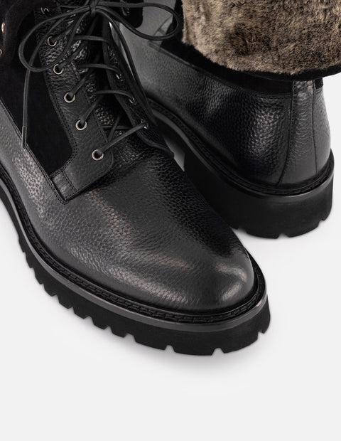 Botines negros para hombre con acabado tipo sherpa