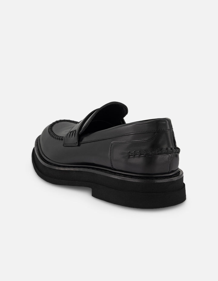 Mocasines negros de piel florantic para hombre con detalle en el empeine
