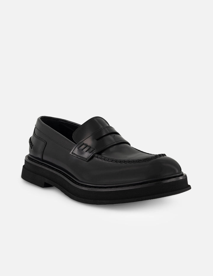 Mocasines negros de piel florantic para hombre con detalle en el empeine