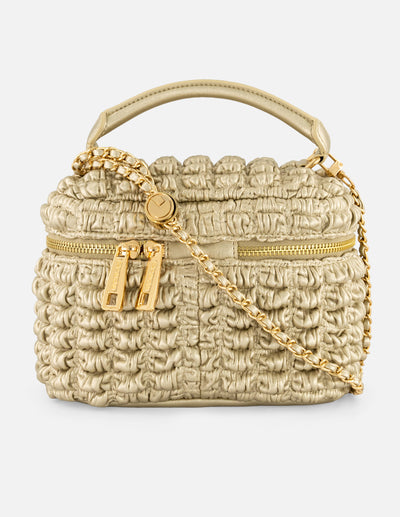 Minibolso color dorado vegano para mujer con diseño capitonado