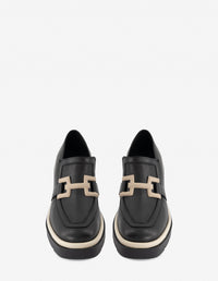 Mocasín en piel napa color negro con hebilla para mujer