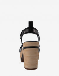 Sandalia en vinilo y piel de color negro para mujer