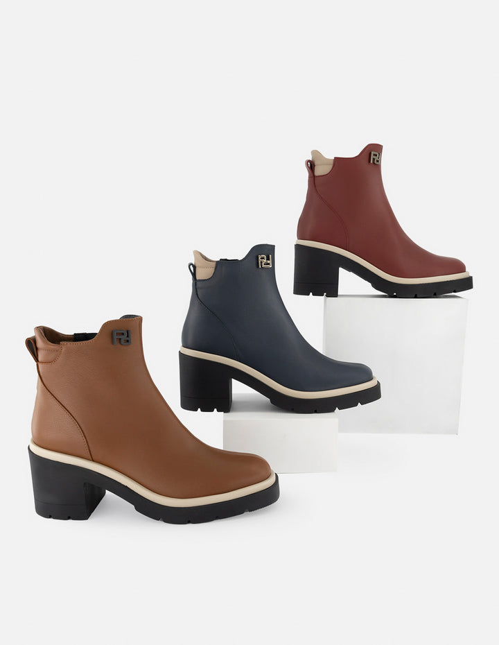 Botín de piel napa color caoba para mujer con contraste blanco