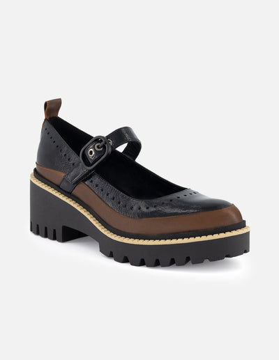 Zapatilla con pulsera tipo mercedes color negro para mujer con detalle bicolor