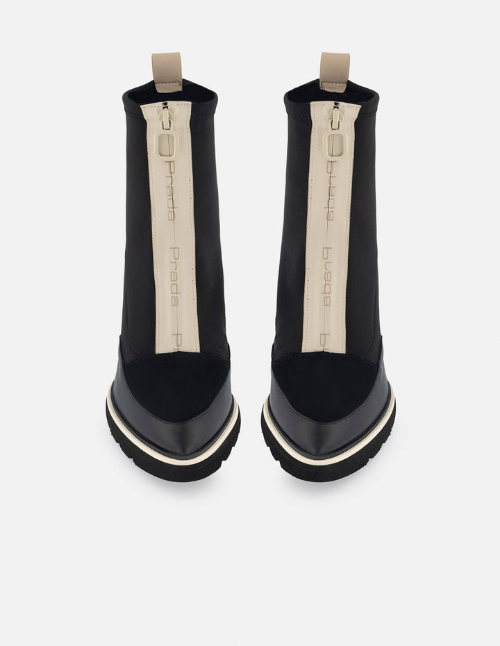 Botín de lycra color negro para mujer con cremallera y detalles de piel