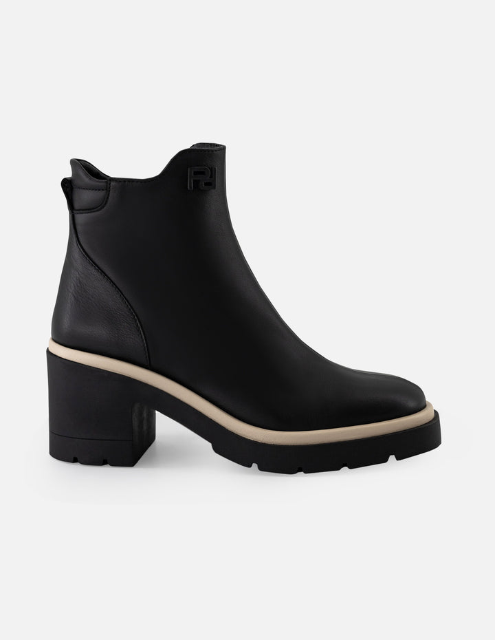 Botín de piel napa color negro para mujer con contraste blanco