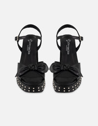 Sandalias negro piel para mujer con moño suave frontal