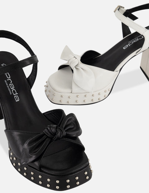 Sandalias negro piel para mujer con moño suave frontal