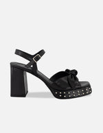 Sandalias negro piel para mujer con moño suave frontal