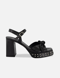 Sandalias negro piel para mujer con moño suave frontal