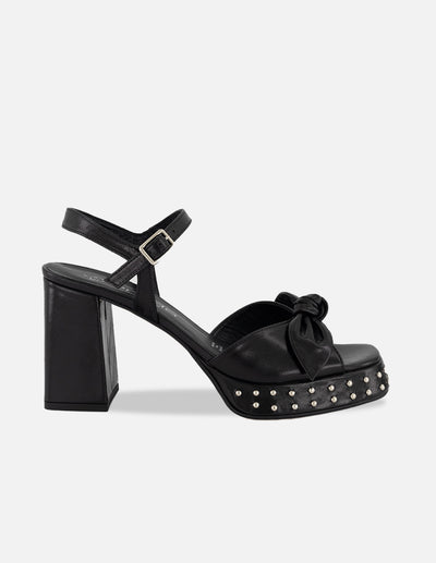 Sandalias negro piel para mujer con moño suave frontal