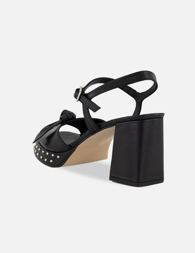 Sandalias negro piel para mujer con moño suave frontal
