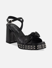 Sandalias negro piel para mujer con moño suave frontal