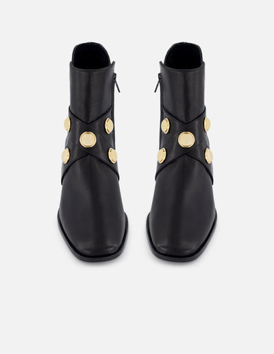 Botín de piel color negro para mujer con detalles color dorado