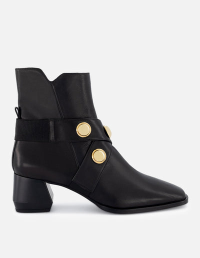 Botín de piel color negro para mujer con detalles color dorado