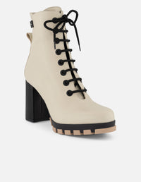 Botines blancos piel bombeada para mujer con suela track