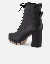 Botines negros piel bombeada para mujer con suela track