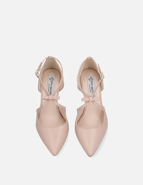 Zapatilla piel tiras cruzadas con moño color nude