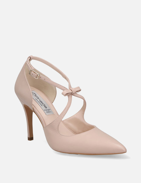 Zapatilla piel tiras cruzadas con moño color nude