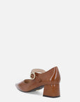 Zapato tipo Mary Jane en piel cuero con hebilla circular con decorado de pedrería para dama