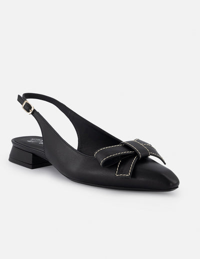 Zapatilla destalonada de piel para mujer color negro con moño decorativo al frente