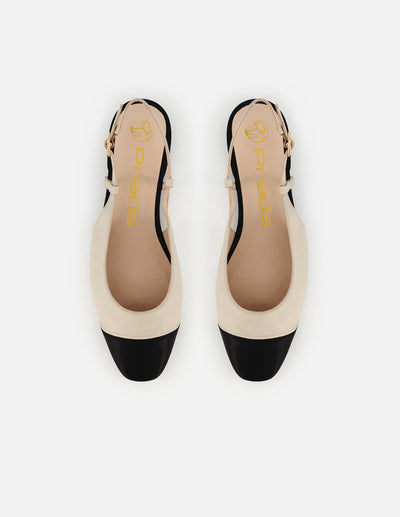 Zapato destalonado de piel color blanco con contraste en negro para mujer