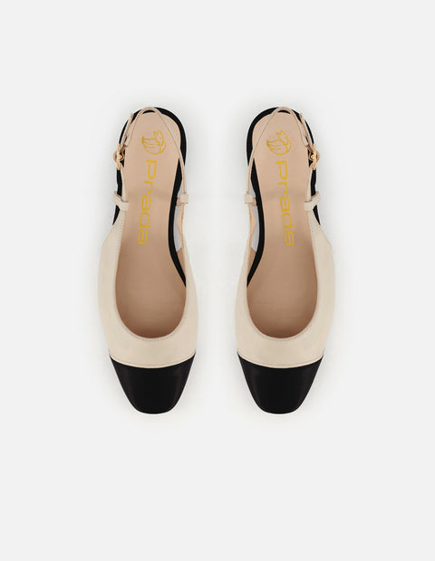 Zapato destalonado de piel color blanco con contraste en negro para mujer