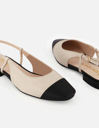 Zapato destalonado de piel color blanco con contraste en negro para mujer