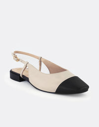 Zapato destalonado de piel color blanco con contraste en negro para mujer