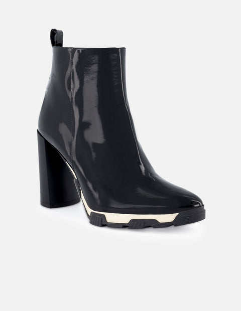Botin para mujer de piel charol color negro con detalles en color blanco