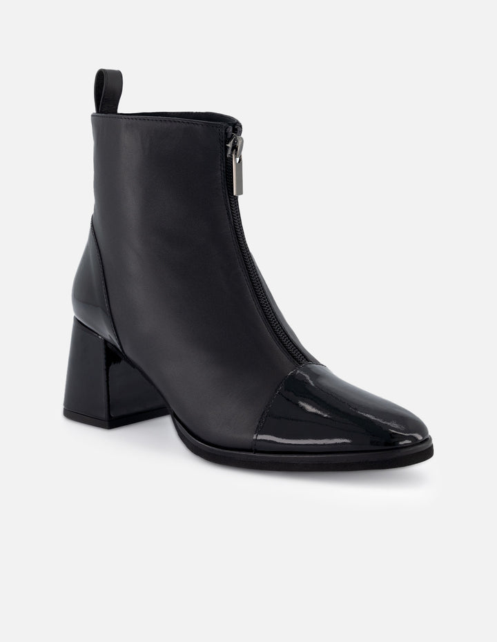 Botín de piel para mujer color negro y detalles en charol y cremallera frontal